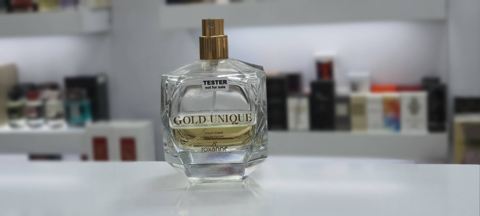 عطر ادوپرفیوم زنانه رکسان مدل Gold Unique حجم ۱۰۰ میلی لیتر